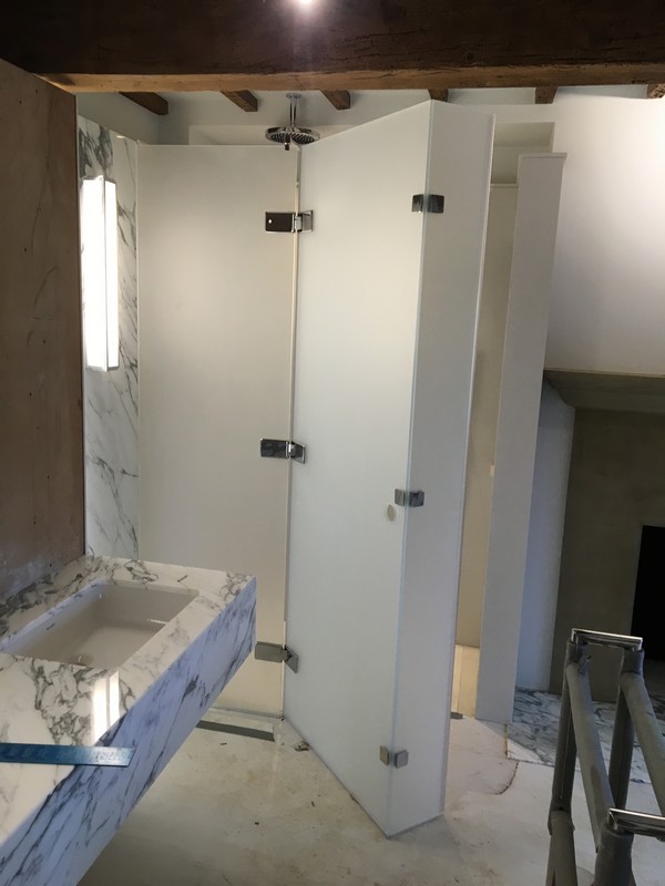 Bespoke frosted glass shower enclosure in Stockwell luxury bathroom